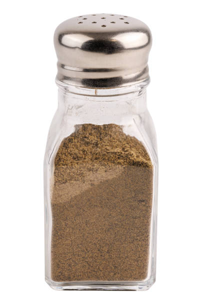 istock glass pepper pot with ground black pepper isolated on white background 1400651357