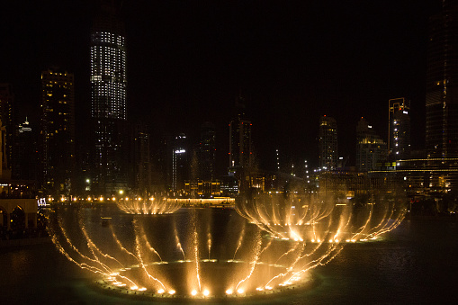 Dubai, UAE - May 16, 2022: Fontaines evening show near Dubai mall, UAE.