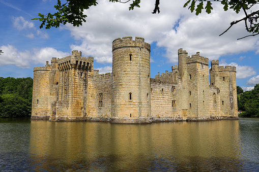 East Sussex, UK- May 27, 2022: The scenic view of Bodiam Castle. Bodiam Castle is a 14th-century moated castle near Robertsbridge in East Sussex, England.