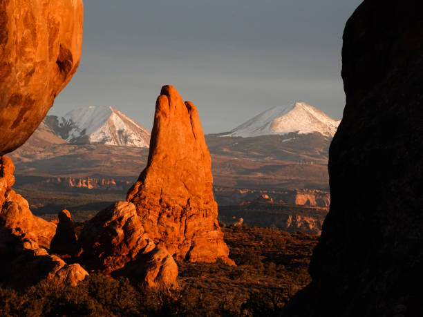 istock Pinnacles and LaSal Mountains at sunset. Arches National Park 1400655104