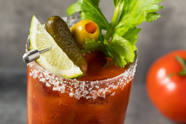 Boozy Refreshing Bloody Mary Cocktail Boozy Refreshing Bloody Mary Cocktail with Vodka and Celery vodka sauce stock pictures, royalty-free photos & images