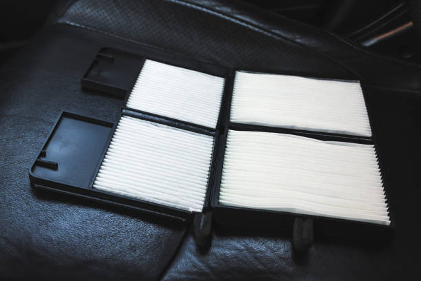 istock New car air filter on a leather black car seat 1400656425