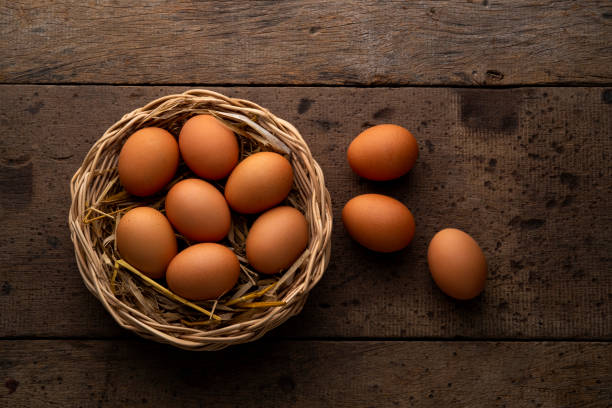 istock Heap of Chicken eggs on wicker basket 1400659297