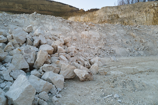 Open pit mining of construction sand stone materials.