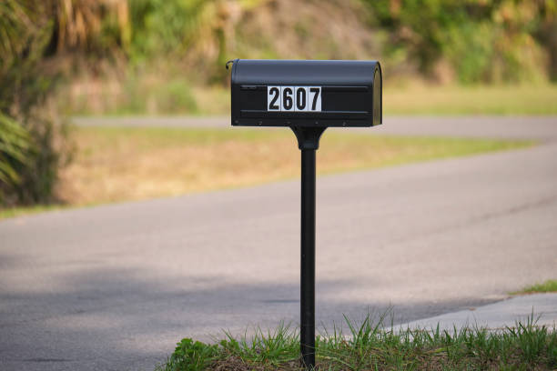 istock Typical american outdoors mail box on suburban street side 1400664791
