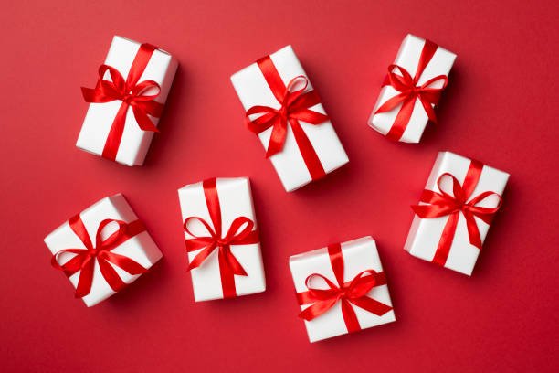 istock Top view of gift boxes on color background 1400671389