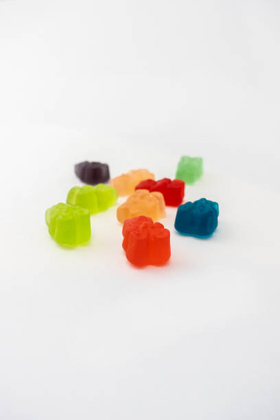 istock Colorful set of CBD infused medicinal candy gummies used for healing on a plain white background 1400674775
