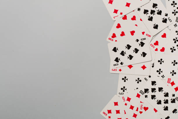 istock Playing cards on color background. Gambling concept. Top view 1400676848