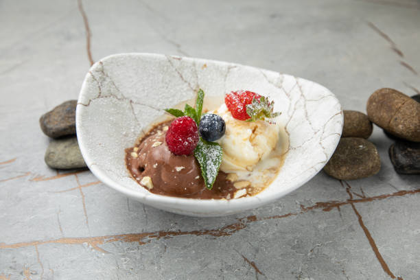 istock ice cream, chocolate, vanilla with berries 1400679351