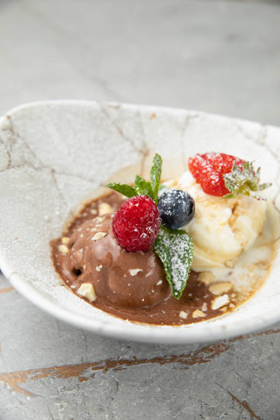 istock ice cream, chocolate, vanilla with berries 1400679362
