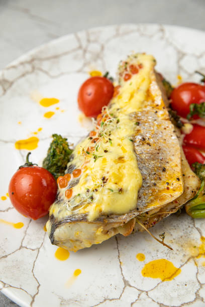 istock baked sea bream fish with tomatoes 1400679404