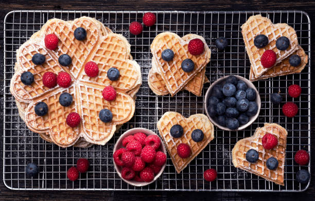 istock Waffles with berry fruit on wooden dark table 1400679476