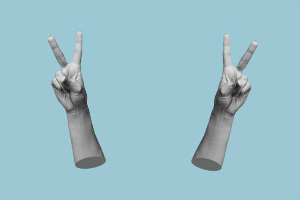 istock Two 3d female hands showing a peace gesture isolated on a blue color background 1400679507