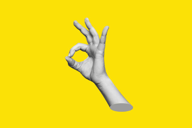 3d female hand showing the ok gesture isolated on a yellow color background The female hand showing the ok gesture isolated on a yellow color background. Trendy abstact 3d collage in magazine urban style. Contemporary art. Modern design. Okay hand sign ok sign photos stock pictures, royalty-free photos & images