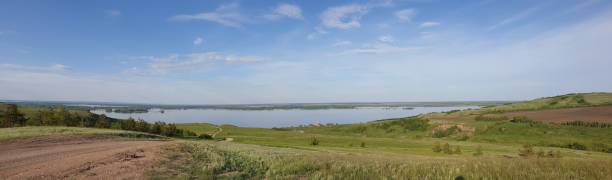istock view of the river from the hill on a sunny spring day. 1400681134