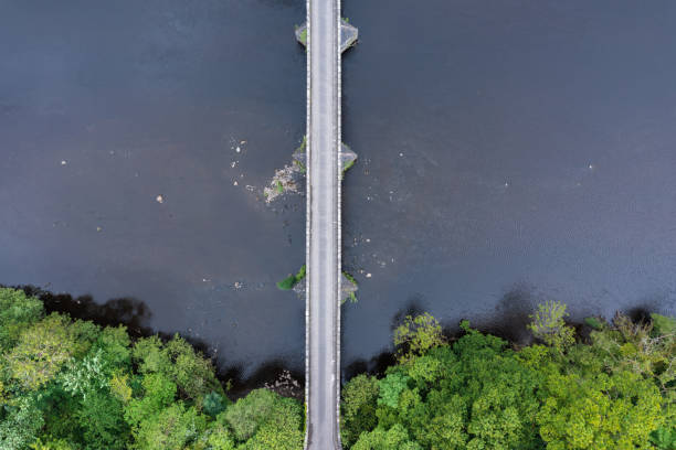 istock Aerial view of an old stone bridge over a river 1400681470