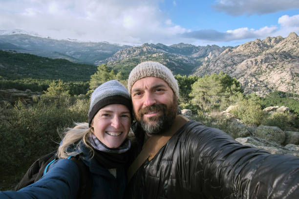 istock Couple taking a selfie in the mountains 1400683877