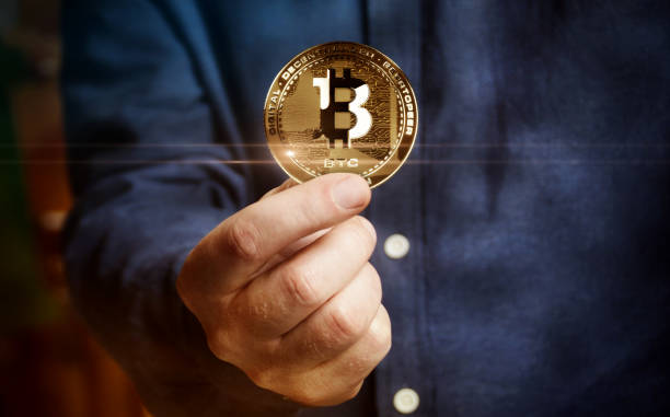 Bitcoin BTC cryptocurrency golden coin 3d illustration Bitcoin BTC cryptocurrency golden coin in hand abstract concept bitcoin stock pictures, royalty-free photos & images