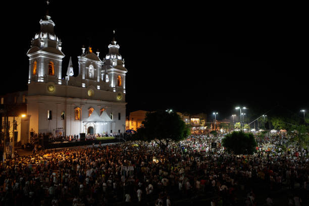 Crowd at Sé Cathedral during Círio de Nazaré 2011 Crowd of people gathered in front of Sé Cathedral for the festivity of Círio de Nazaré, the largest Marian procession of the world, which happens every October in Belém, Pará, Amazon, Brazil. 2011. cirio de nazare stock pictures, royalty-free photos & images