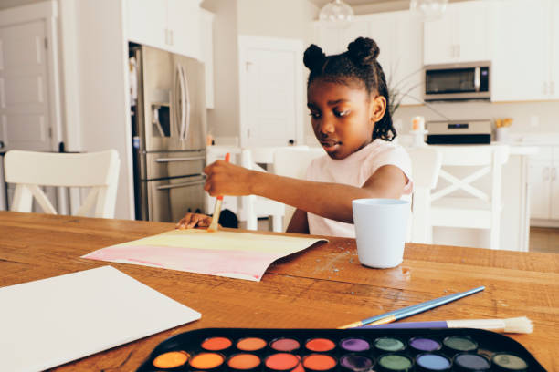 istock Children Watercolor Painting in a Home 1400689708