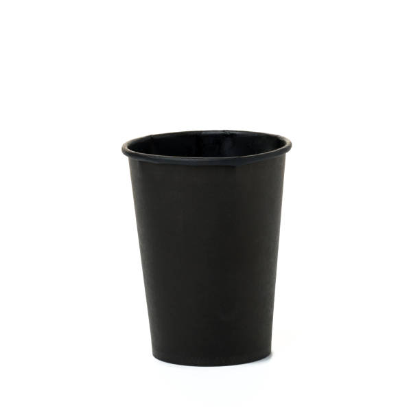 istock Empty black paper disposable cupon a white background, concept eco-friendly 1400689954