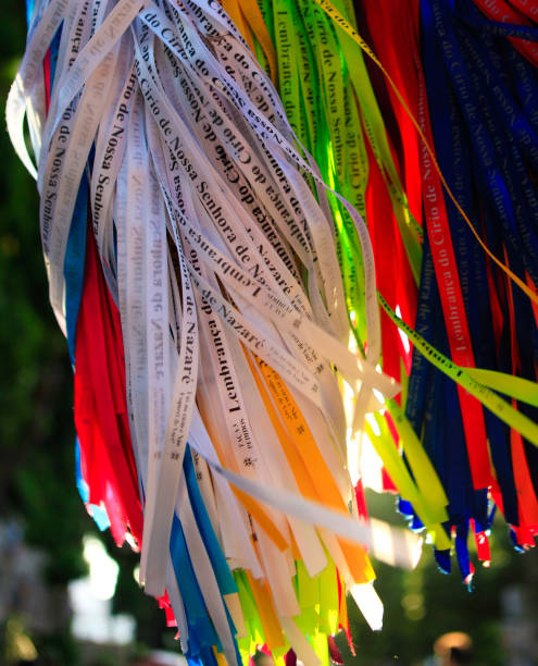 Arm bands or fitinhas of Círio de Nazaré “Fitas do Círio”, coloured arm bands symbol of Círio de Nazaré, the largest Marian procession of the world, which happens every October in Belém, Pará, Amazon, Brazil. cirio de nazare stock pictures, royalty-free photos & images