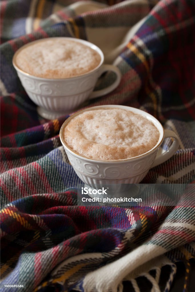 Two Chocolate Hazelnut Lattes for a Cozy Morning Treat Blanket Stock Photo