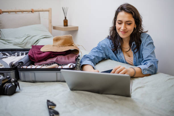 istock Young woman booking her next trip 1400698427