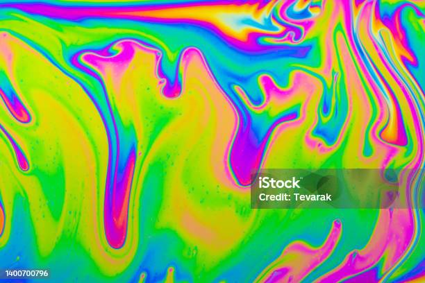 Psychedelic Multicolored Background Abstract Rainbow Colors Patterns Background Photo Macro Shot Of Soap Bubbles Stock Photo - Download Image Now