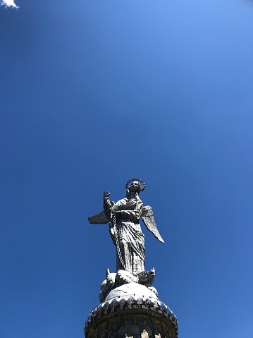 El Panecillo Madonna or The Virgin of Quito statue, is religious statue on El Panecillo, a 200-meter-high hill above city of Quito, Ecuador.\n\n\n\nJuly 10, 2021 - Quito, Pichincha, Ecuador: A general landscape view of Quito Old City, UNESCO World Heritage Site.\n\nSan Francisco de Quito, is the capital and second most populous city of Ecuador after Guayaquil, with an estimated population of 2.8 million in its urban area. It is also the capital of the province of Pichincha. Quito is located in a valley on the eastern slopes of Pichincha,an active stratovolcano in the Andes, at an elevation of 2,850 m (9,350 ft), making it the second-highest capital city in the world.\n\nTravel Concept.