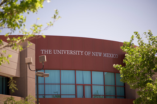 Albuquerque, New Mexico, USA - May 13, 2022: Sign on The University of New Mexico building in Albuquerque, New Mexico near University Boulevard.