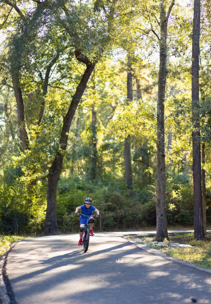 istock Riding a Bike in a trail 1400708496