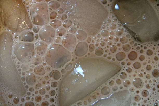 Abstract - Iced Mocha Coffee closeup with ice and bubbles