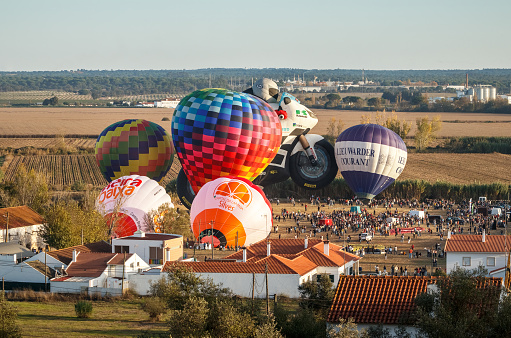 Coruche, Portugal - November 13, 2021: Coruche is a Ribatejo village bathed by the waters of the Sorraia River and surrounded by agricultural fields, with agriculture being the main economic activity. Every year, with the fourth edition in 2021, the ballooning festival is held, attracting thousands of visitors.