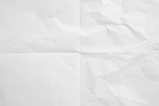 istock White folded and wrinkled paper texture background 1400712773