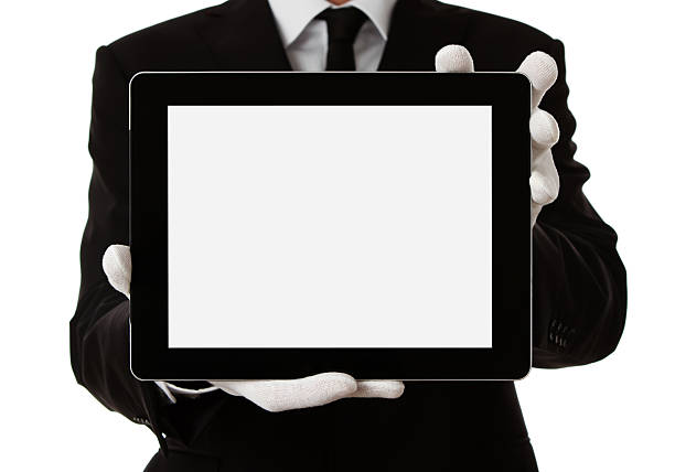 mordomo segurando a tablet digital - first class butler white glove - fotografias e filmes do acervo