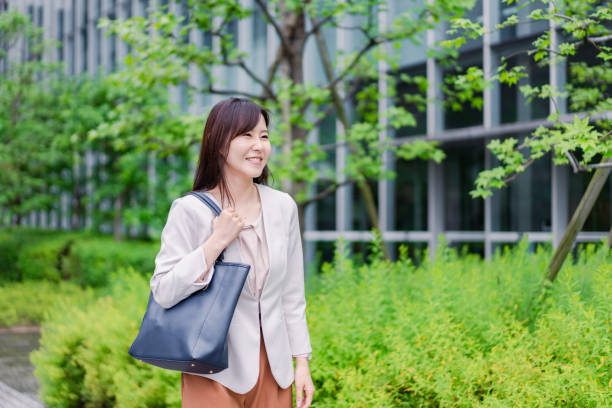 istock Young businesswoman going to office 1400727590