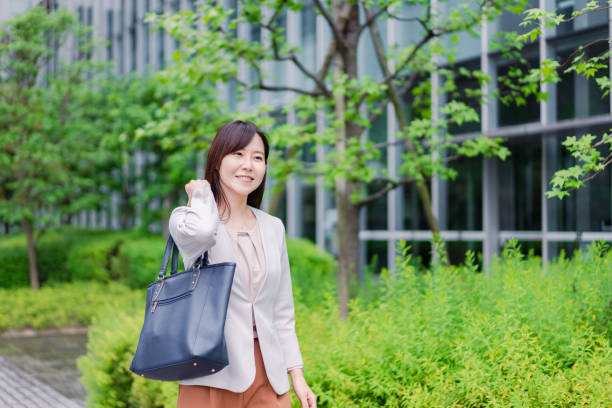 istock Young businesswoman going to office 1400727592