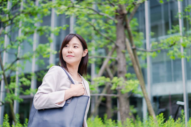 istock Young businesswoman going to office 1400727602