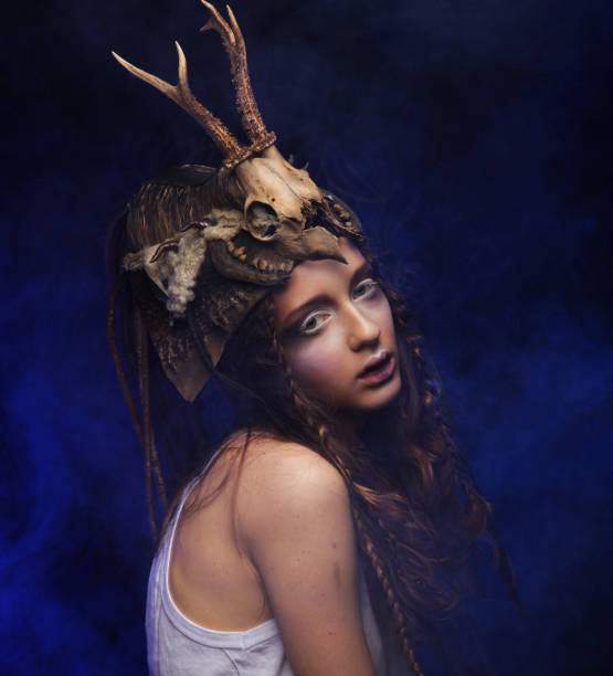 istock Young woman with creative make up. Halloween theme. 1400736986