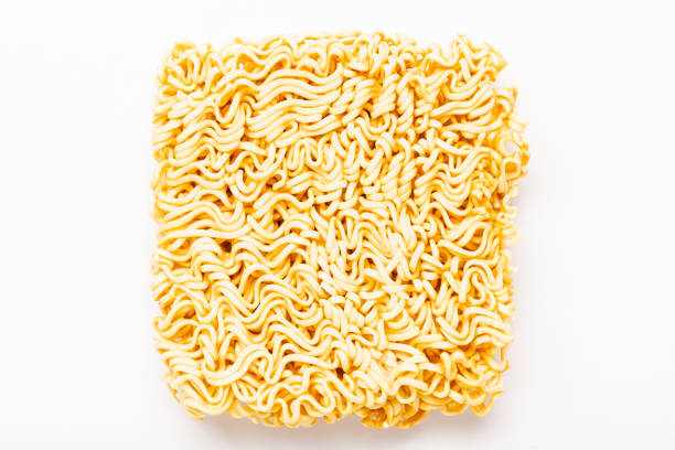 istock Raw instant noodles on white background. 1400740250