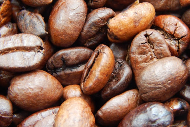 istock Beautiful grains of coffee, close up. Background, texture 1400741156