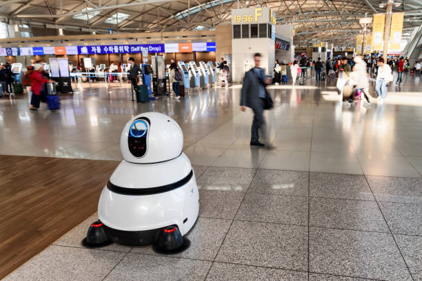 The airport cleaning robot in main hall of Incheon airport. stock photo