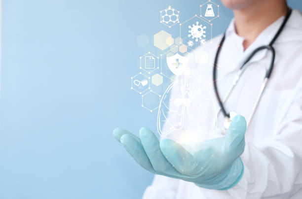 istock Doctor holding virtual lungs in his hands. Hand Drawn human organ, right side copy space Hospital service concept in healthcare. Doctor holding and diagnosing virtual human lung against. 1400749610