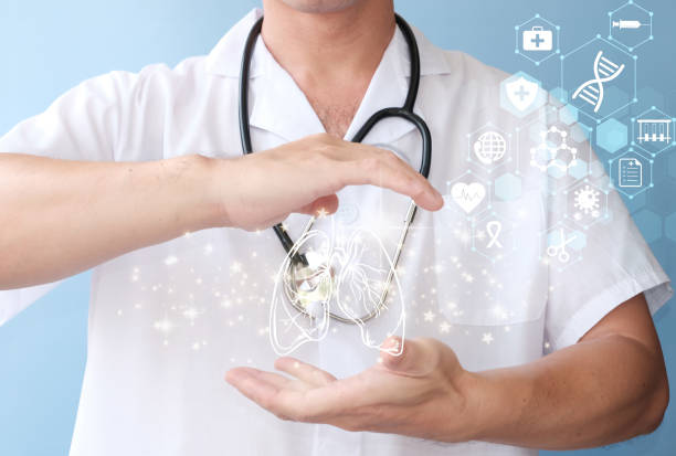 istock Doctor holding virtual lungs in his hands. Hand Drawn human organ, right side copy space Hospital service concept in healthcare. Doctor holding and diagnosing virtual human lung against. 1400749622