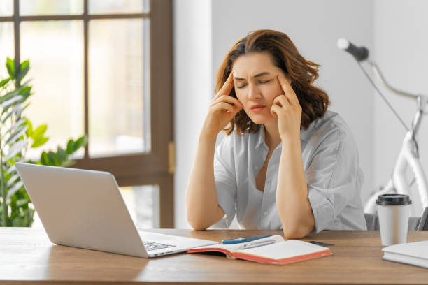 istock woman working in the office 1400750460