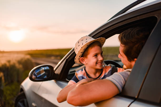 istock Beautiful father and son enjoying on a road trip 1400751854