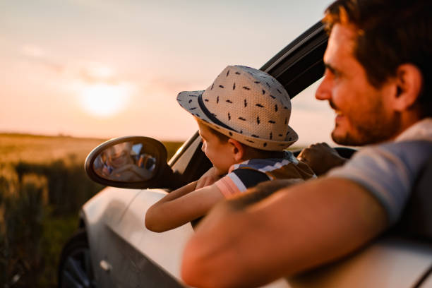 istock Beautiful father and son enjoying on a road trip 1400751870