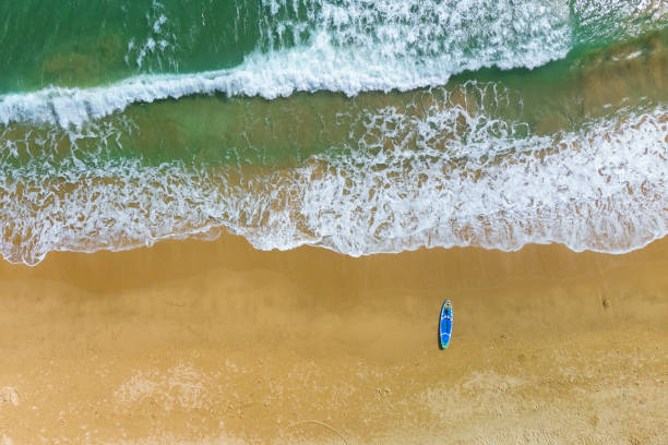 istock Awesome aerial view of sand beach and white crested waves 1400756957