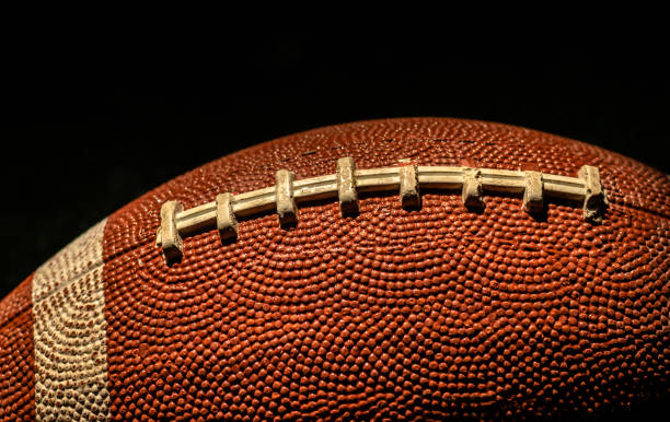 istock American football ball texture as background 1400760411